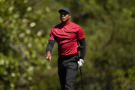 Tiger Woods walks down the fifth fairway during the final round at the Masters golf tournament on Sunday, April 10, 2022, in Augusta, Ga. (AP Photo/Jae C. Hong)