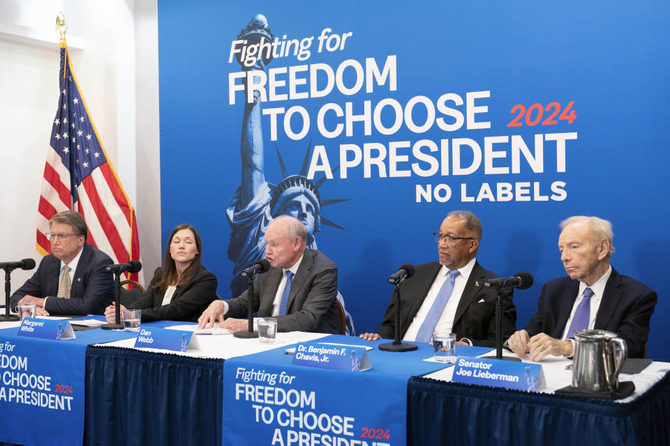 FILE - No Labels leadership and guests from left, Pat McCrory, Co-Executive Director Margaret White, Dan Webb, National Co-Chair Dr. Benjamin F. Chavis and No Labels Founding Chairman and former Senator Joe Lieberman speak about the 2024 election at National Press Club, in Washington, Jan. 18, 2024. Lieberman served as No Labels' chief public defender when the critics got the loudest. Now, Lieberman is gone. His death marks an irreplaceable loss for No Labels. ( AP Photo/Jose Luis Magana, File)