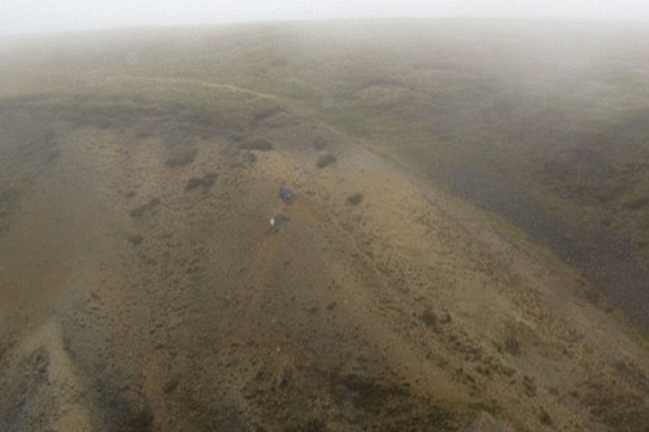 Two walkers cling to cliff after footpath disintegrates