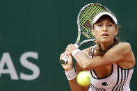 Vitalia Diatchenko of Russia plays a shot against Serena Williams of the U.S. during their first round match of the French Open tennis tournament at the Roland Garros stadium in Paris, Monday, May 27, 2019. (AP Photo/Pavel Golovkin)