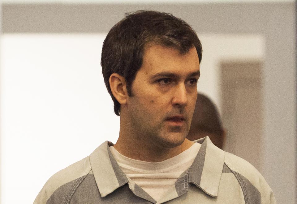 Former South Carolina police officer Michael Slager walks to the defense table during his bond hearing in Charleston, South Carolina September 10, 2015. Slager told a South Carolina judge on September 11, 2015 that he was not a flight risk and should be released on bond while awaiting his trial in death of an unarmed black man who was shot in the back while fleeing a traffic stop. REUTERS/Randall Hill