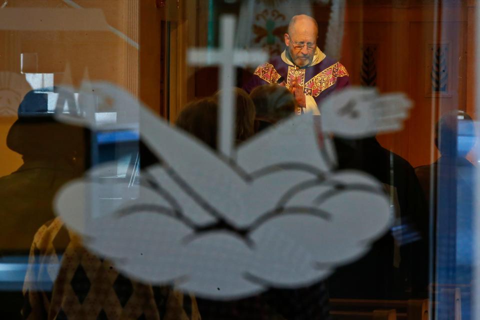 In this 2022 file photo, parishioners celebrate Ash Wednesday at Our Lady's Chapel in downtown New Bedford.