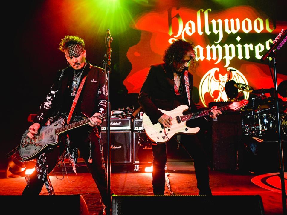 Depp performing with Alice Cooper at a Hollywood Vampires show (Getty Images)