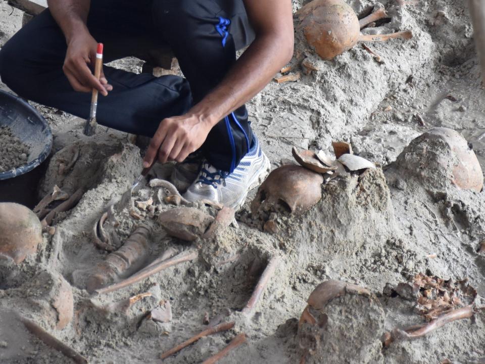 Staff dig up skeletons at a site of a former war zone in Mannar, Sri Lanka: Reuters