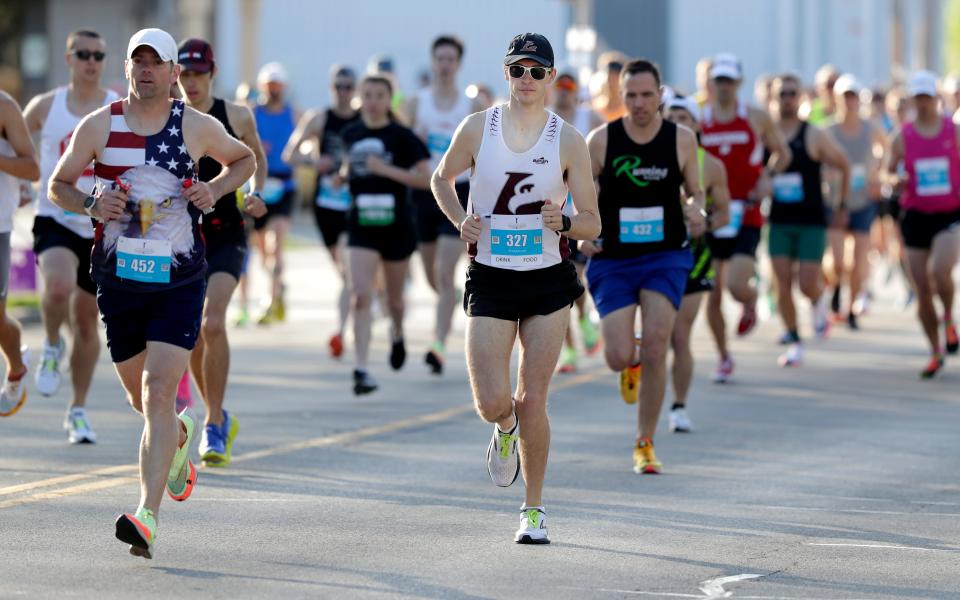 Participants compete in the Cellcom Green Bay Marathon on May 15, 2022, in Green Bay.