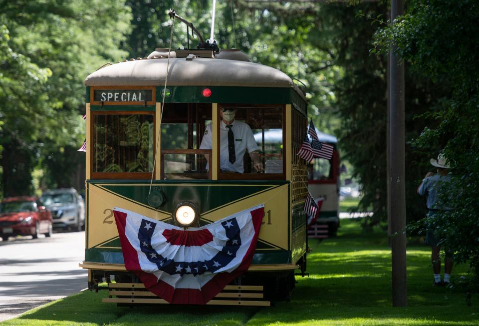 Birney Car 21 travels ahead of Birney Car 25 along Mountain Avenue in Fort Collins on July 4, 2020.