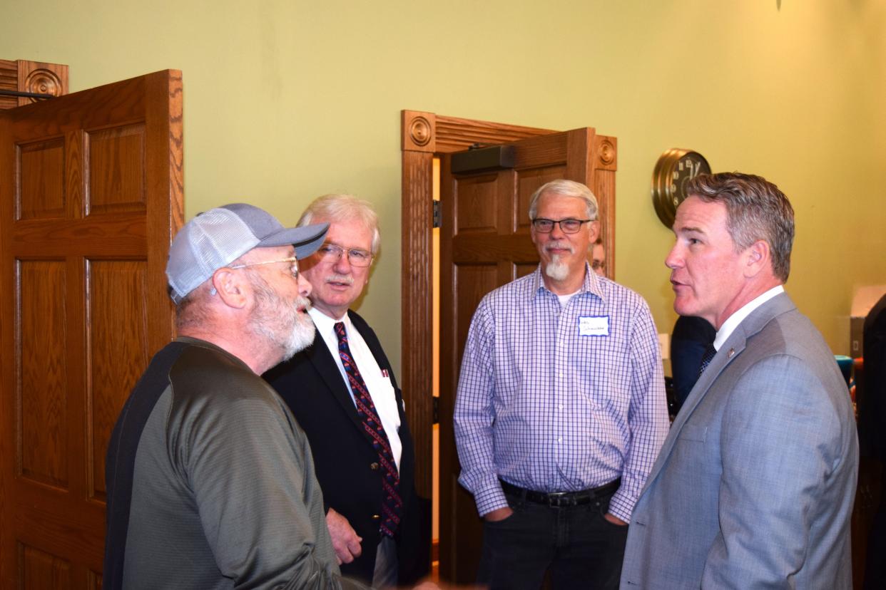 John Husted, Ohio's lieutenant governor, visits with Craig Lawhead, Robin Hovis and West Schmucker at Farmstead Restaurant in Berlin on Tuesday. Husted said Ohio has the most private sector jobs in the history of the state.