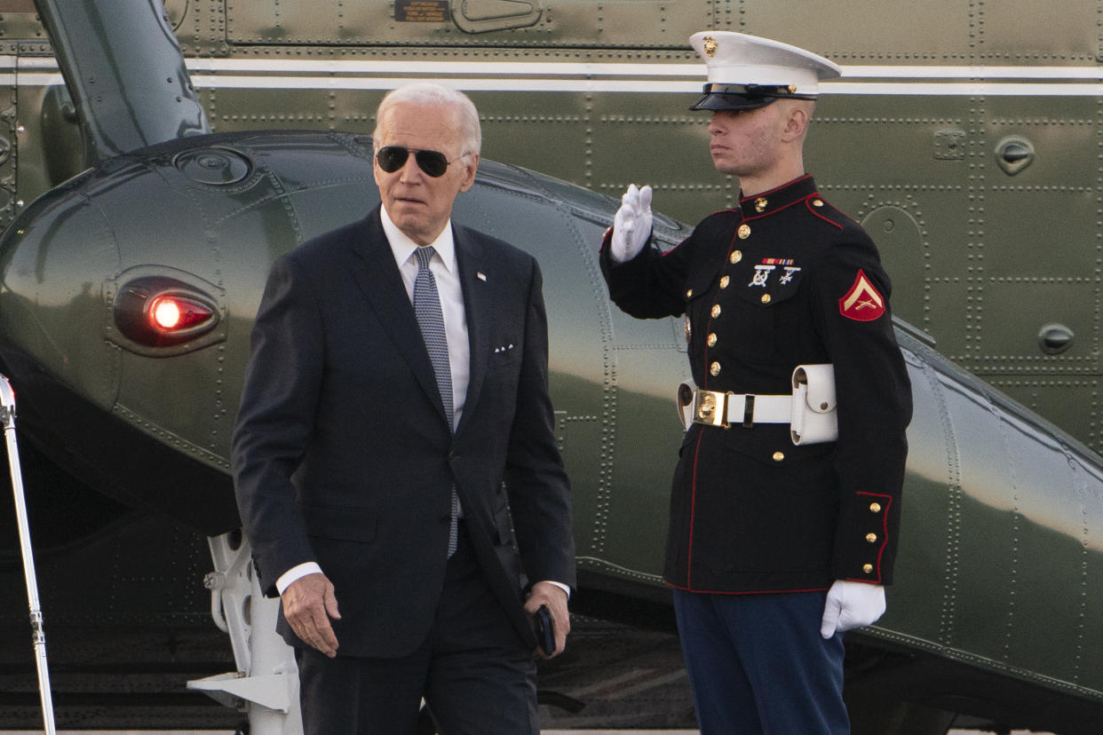 President Joe Biden walks from Marine One upon arrival at the Gordons Pond in Rehoboth Beach, Del., Friday, Oct. 21, 2022. (AP Photo/Manuel Balce Ceneta)