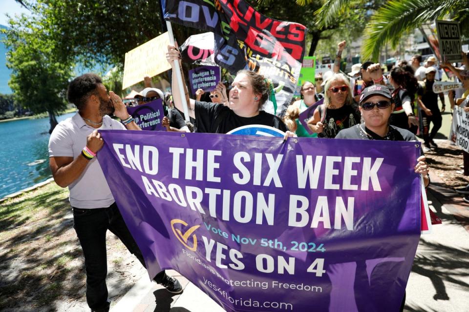 Abortion rights advocates gather to launch their 'Yes On 4' campaign with a march and rally against the six-week abortion ban ahead of November 5, when Florida voters will decide on whether there should be a right to abortion in the state, in Orlando, Florida, U.S. April 13, 2024 (REUTERS)