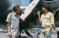 <p>Television host David Frost interviews John Travolta at an airfield in 1978. The movie star ventured into the cockpit during the special. </p>