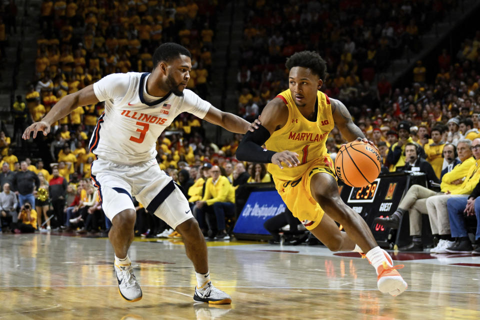 Maryland guard Jahmir Young (1) drives to the basket against Illinois guard Jayden Epps (3) during the second half of an NCAA college basketball game, Friday, Dec. 2, 2022, in College Park, Md. (AP Photo/Terrance Williams)