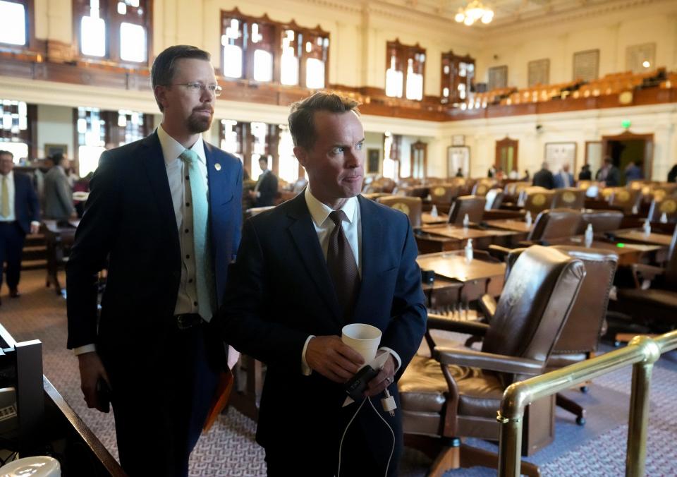 House Speaker Dade Phelan, right, and Rep. Will Metcalf, R - Conroe, walk off the House Floor after adjourning Sine Die after only one day of the first special session at the Capitol on Tuesday May 30, 2023.