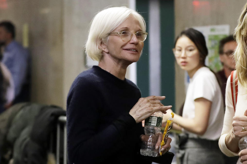 Actress Ellen Barkin waits to attend the rape trial of Harvey Weinstein, Thursday, Jan. 23, 2020, in New York. (AP Photo/Richard Drew)