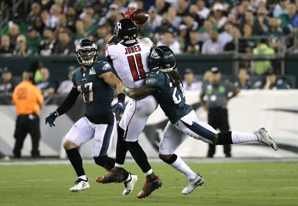 Atlanta Falcons' Julio Jones (11) cannot catch a pass between Philadelphia Eagles' Ronald Darby (21) and Nate Gerry (47) during the first half of an NFL football game Thursday, Sept. 6, 2018, in Philadelphia. (AP Photo/Michael Perez)
