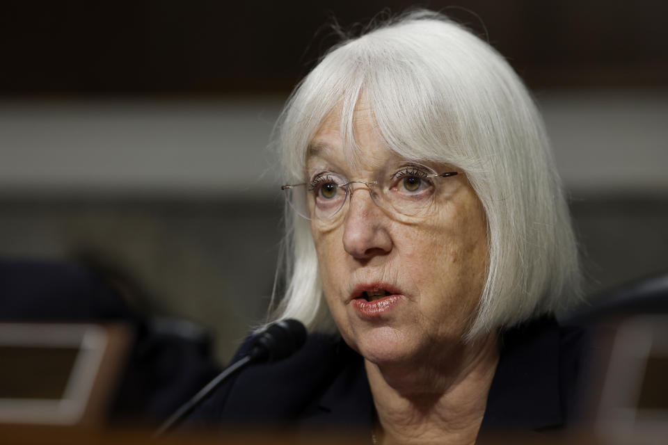 Murray speaks into a microphone at her desk during a Senate Health, Education, Labor and Pensions Committee hearing.