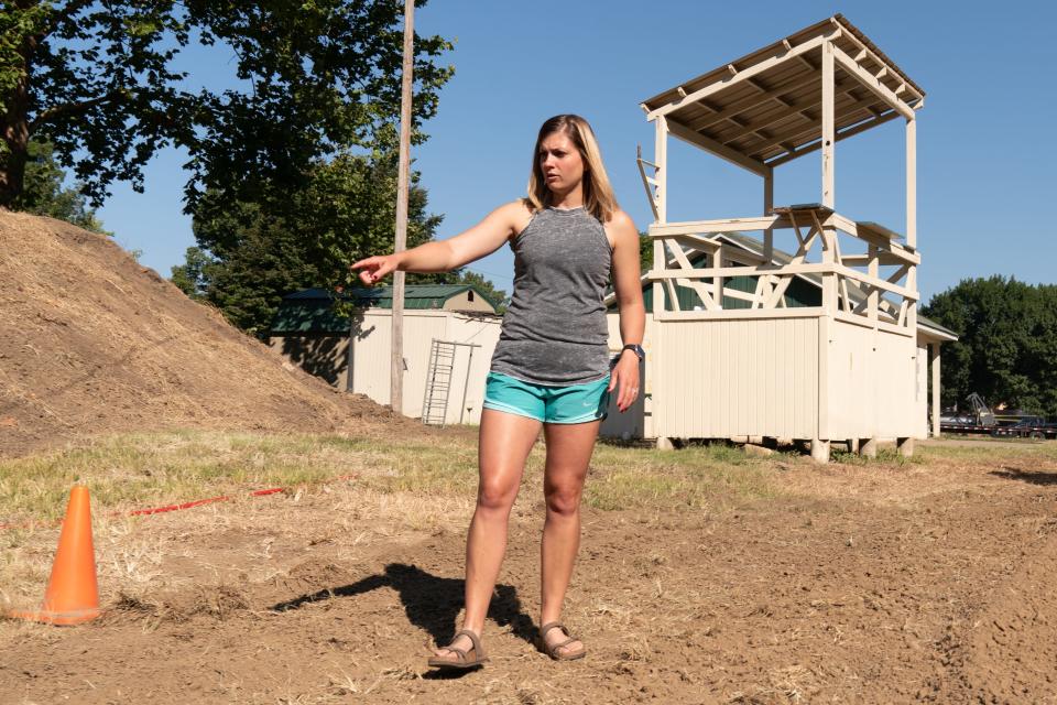 Heartland BMX track operator Sydney Akin on Sept. 2 points out where a roller will be added in at the track. That and other improvements will bring it up to a national track standard.