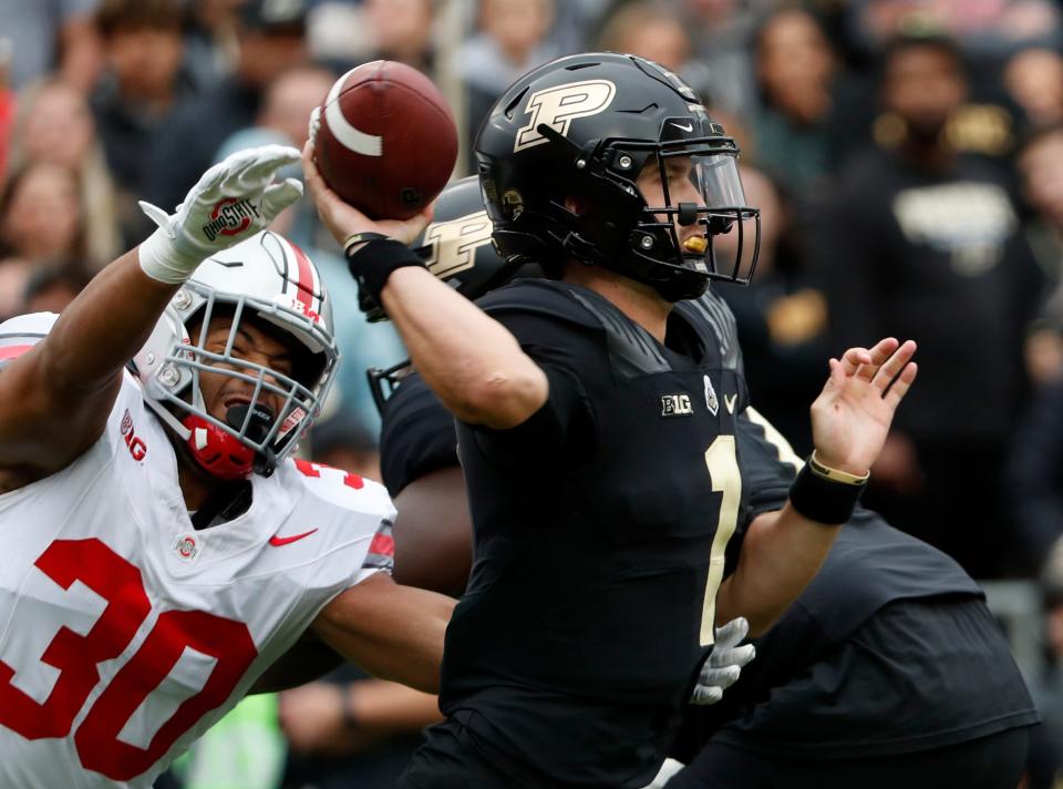 Purdue Boilermakers quarterback Hudson Card (1) passes the ball during the NCAA football game against the Ohio State Buckeyes, Saturday, Oct. 14, 2023, at Ross-Ade Stadium in West Lafayette, Ind. Ohio State Buckeyes won 41-7.