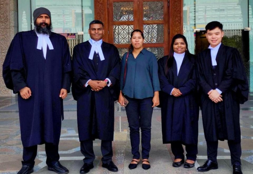 (From left) Lawyer Shamsher Singh Thind, lawyer Srimurugan Alagan, Loh Siew Hong (centre), lawyer Gunamalar Joorindanjn, lawyer Tony Thian Yee Chin. — Picture courtesy of Loh Siew Hong’s lawyers