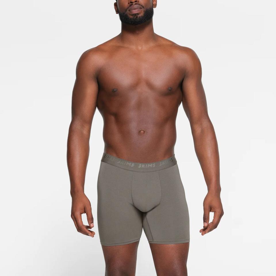 model wearing gray boxer briefs