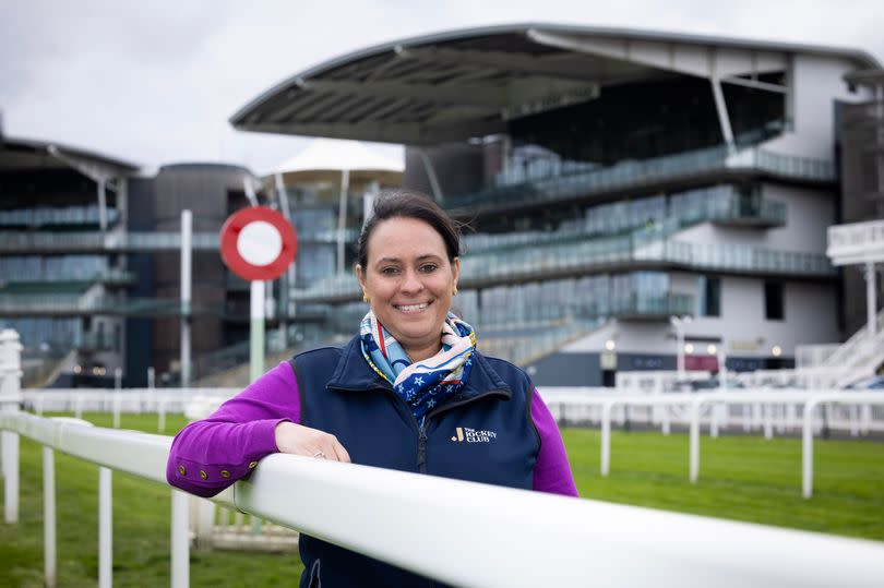 Sulekha Varma pictured at the finishing post at Aintree Racecourse ahead of the Grand National