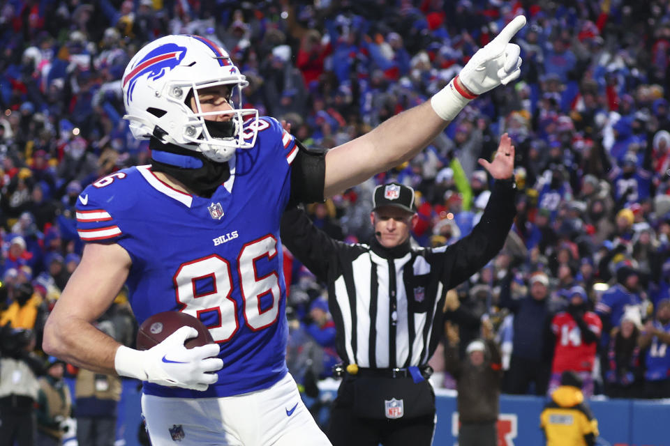 Buffalo Bills tight end Dalton Kincaid (86) reacts after scoring a touchdown against the Pittsburgh Steelers during the first quarter of an NFL wild-card playoff football game, Monday, Jan. 15, 2024, in Buffalo, N.Y. (AP Photo/Jeffrey T. Barnes)