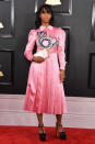 <p>To complete her Gucci getup, Santigold carried a pretty clutch. (Photo: Getty Images) </p>