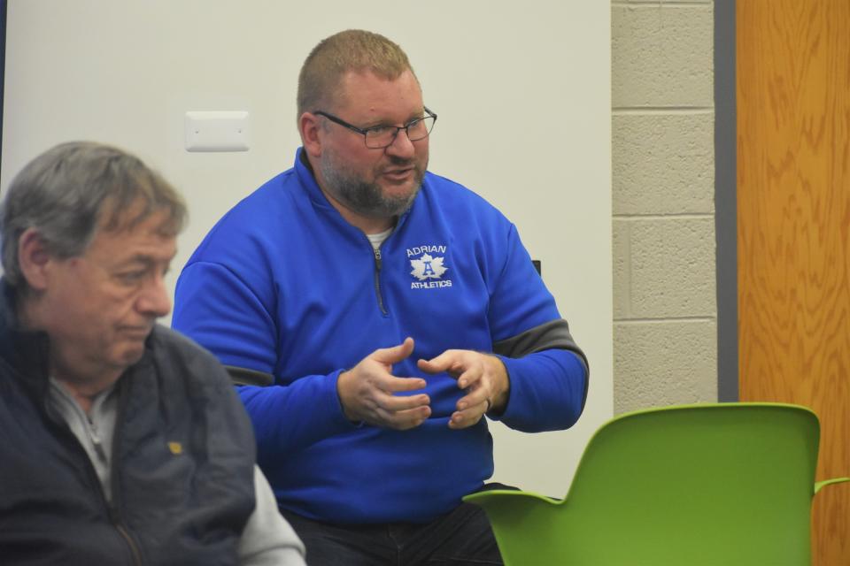 Retired Adrian Public Schools Superintendent Bob Behnke addresses a crowd of nearly 30 people Friday during a seminar titled "So You Want to Run for City Commission?" Also participating in the seminar was Adrian City Commissioner Gordon Gauss, left.