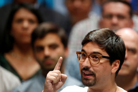 Freddy Guevara, first Vice-President of the National Assembly and lawmaker of the Venezuelan coalition of opposition parties (MUD), talks to the media during a news conference in Caracas, Venezuela July 17, 2017. REUTERS/Carlos Garcia Rawlins