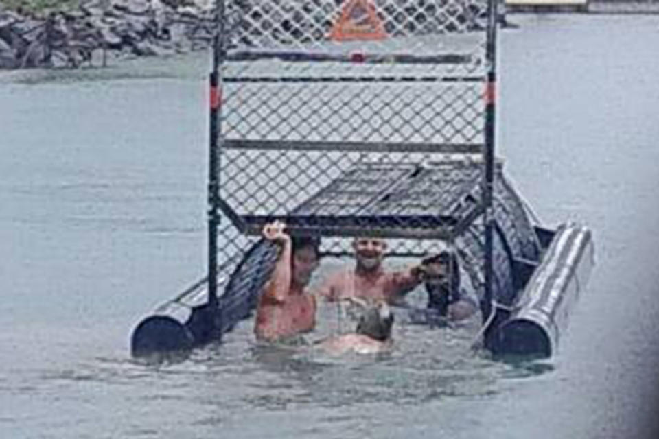 'Idiots': The four men appeared to be enjoying risking their lives: Stacy W Clayton/Facebook