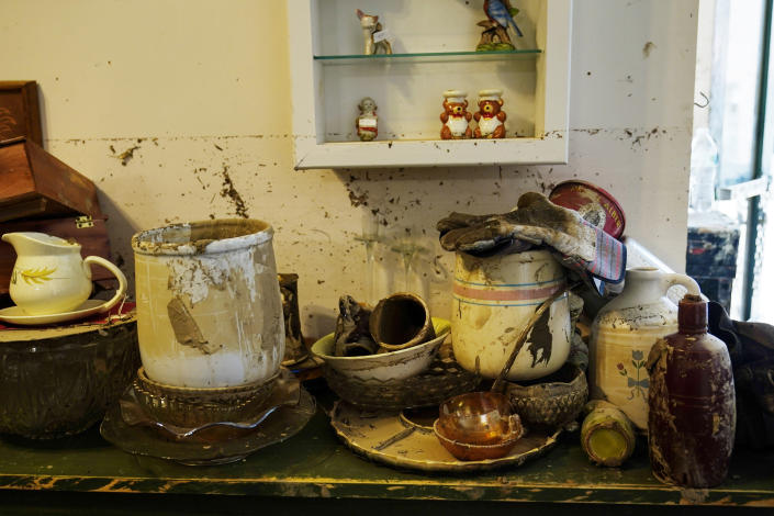 Inside Charles Hawkins' antique shop, belongings were damaged in the a flood, however he and his family are starting to rebuild the shop on Friday, Aug. 5, 2022, in Fleming-Neon, Ky. (AP Photo/Brynn Anderson)