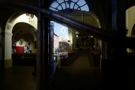The entrance of a church is seen in Nikiszowiec district in Katowice, Poland, October 31, 2018. REUTERS/Kacper Pempel