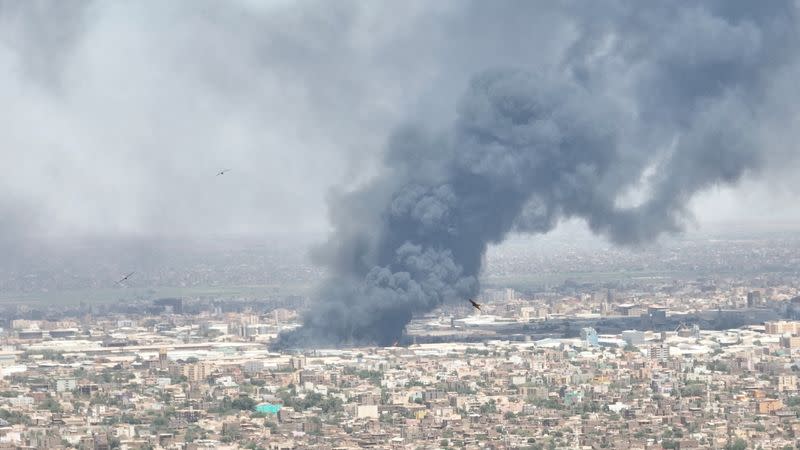 FILE PHOTO: Drone footage shows dense smoke rising from fires near capital Khartoum