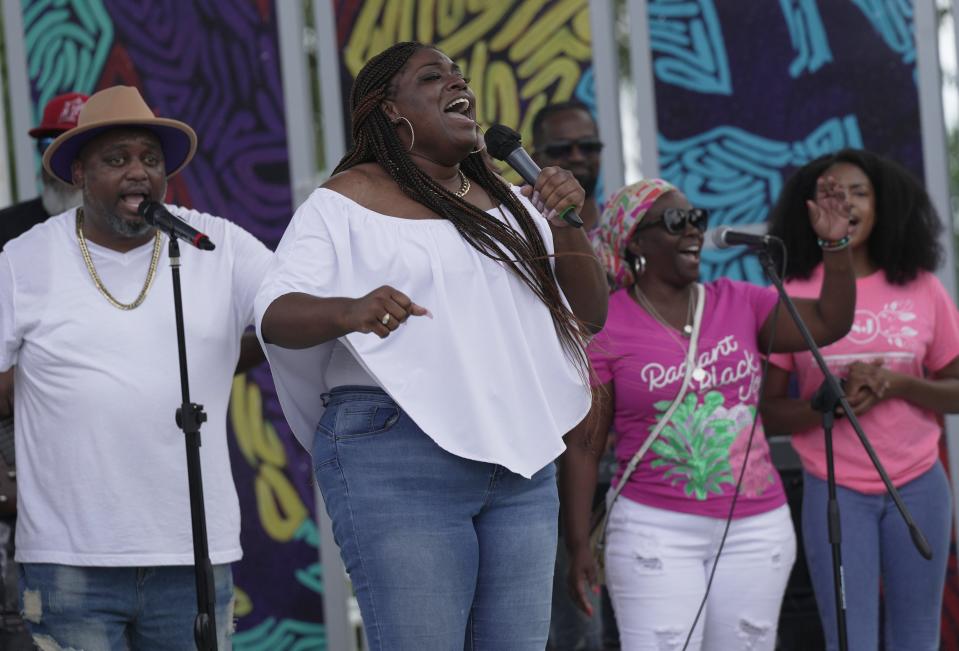 Members of the St. John Missionary Baptist Church perform during the Juneteenth Festival held at Sara Sims Park. The family friendly event featured food trucks, music, children's activities such as bounce houses, face painting and games on Monday, June 19, 2023 in Boynton Beach.