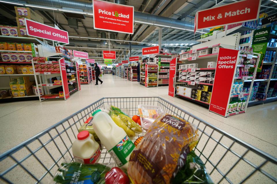 A shopping trolley is seen at a supermarket in Manchester, Britain, March 22, 2023. The United Kingdom's UK consumer price index CPI rose to 10.4 percent in the 12 months to February 2023 from 10.1 percent in January, the Office for National Statistics ONS said on Wednesday. (Photo by Jon Super/Xinhua via Getty Images)