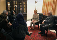<p>First lady Laura Bush (2nd R) and Afghan Foreign Minister Rangeen Dadfar Spanta (R) meet Afghan teachers and students from the American University in Kabul on June 8, 2008. (REUTERS/Musadeq Sadeq/Pool) </p>