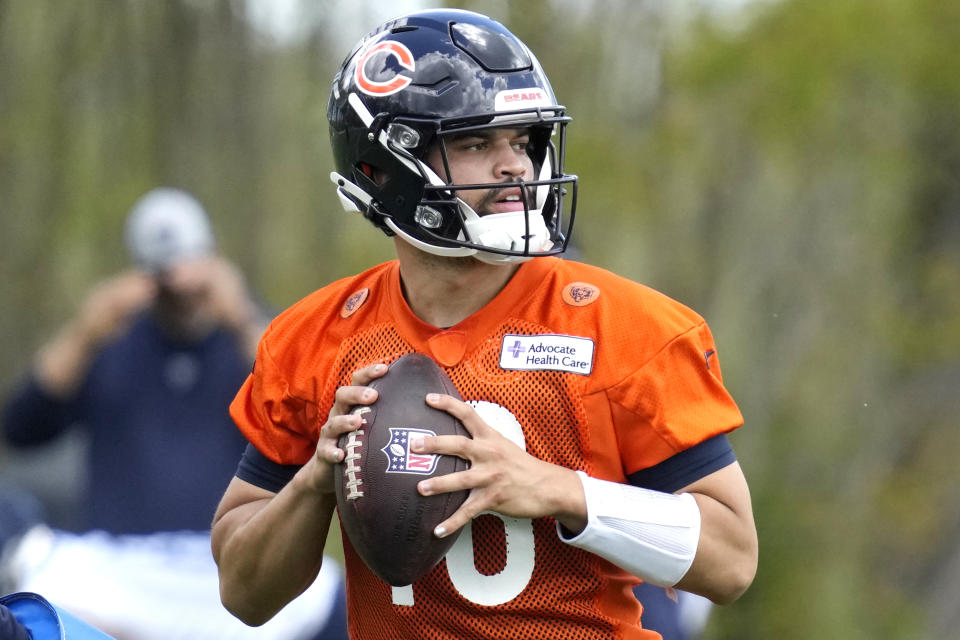 Chicago Bears quarterback Caleb Williams looks to a throw during the NFL football team's rookie camp at Halas Hall in Lake Forest, Ill., Friday, May 10, 2024. (AP Photo/Nam Y. Huh)