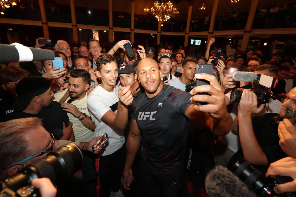 PARIS, FRANCE - AUGUST 31: Ciryl Gane of France poses with fans during the UFC fight night open workout event at La Salle Wagram on August 31, 2022 in Paris, France. (Photo by Jeff Bottari/Zuffa LLC)