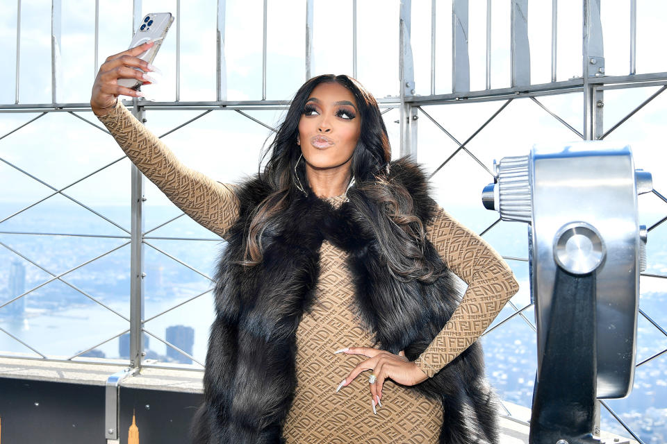 <p>Porsha Williams celebrates the release of her memoir <em>The Pursuits of Porsha</em>, and the premiere of her new series <em>Porsha''s Family Matters, </em>from atop N.Y.C.'s Empire State Building on Nov. 29.</p>