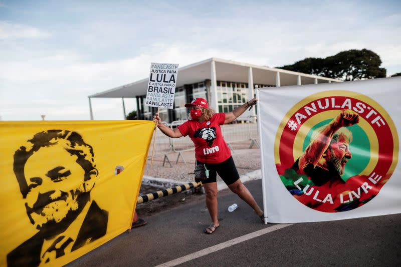 FILE PHOTO: A supporter of Brazil's former President Luiz Inacio Lula da Silva takes part in a protest in front of the Supreme Court in Brasilia