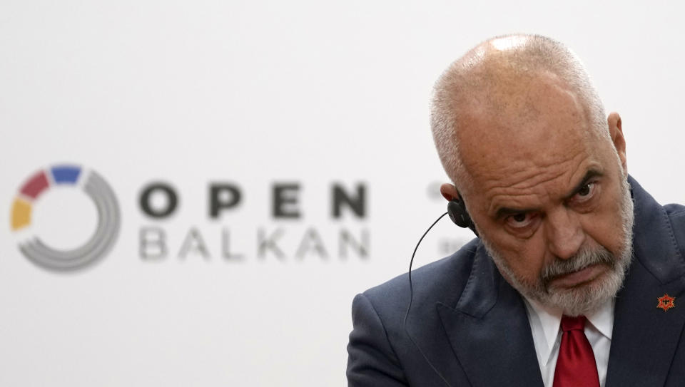 Albanian Prime Minister Edi Rama listens Serbian President Aleksandar Vucic during a press conference after the "Open Balkan" economic forum for regional cooperation in Belgrade, Serbia, Friday, Sept. 2, 2022. (AP Photo/Darko Vojinovic)