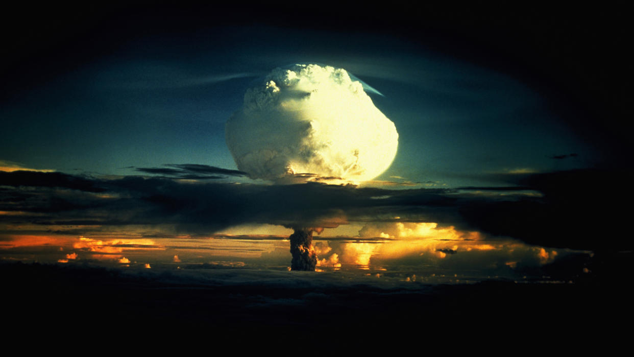  A billowing white mushroom cloud during Operation Ivy, the first test of a hydrogen bomb, at Enewetak Atoll in the Marshall Islands. 