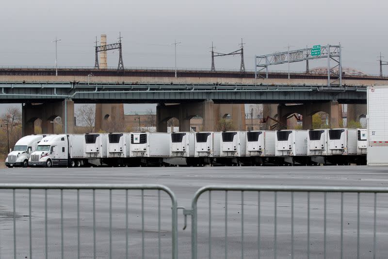 Refrigerated tractor trailers that can be used as morgues are seen, amid the coronavirus disease (COVID-19) outbreak, outside Icahn Stadium on Randall's Island in New York