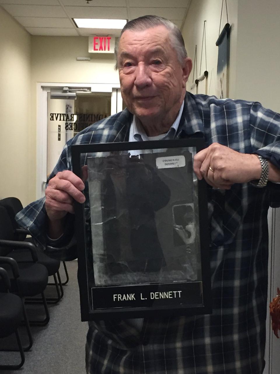 Frank Dennett, who served 29 years on the Kittery Town Council, died on July 30, 2022. In this photo, Dennett holds up his old Town Council packet folder, which is now on display in Kittery Town Hall on Rogers Road.