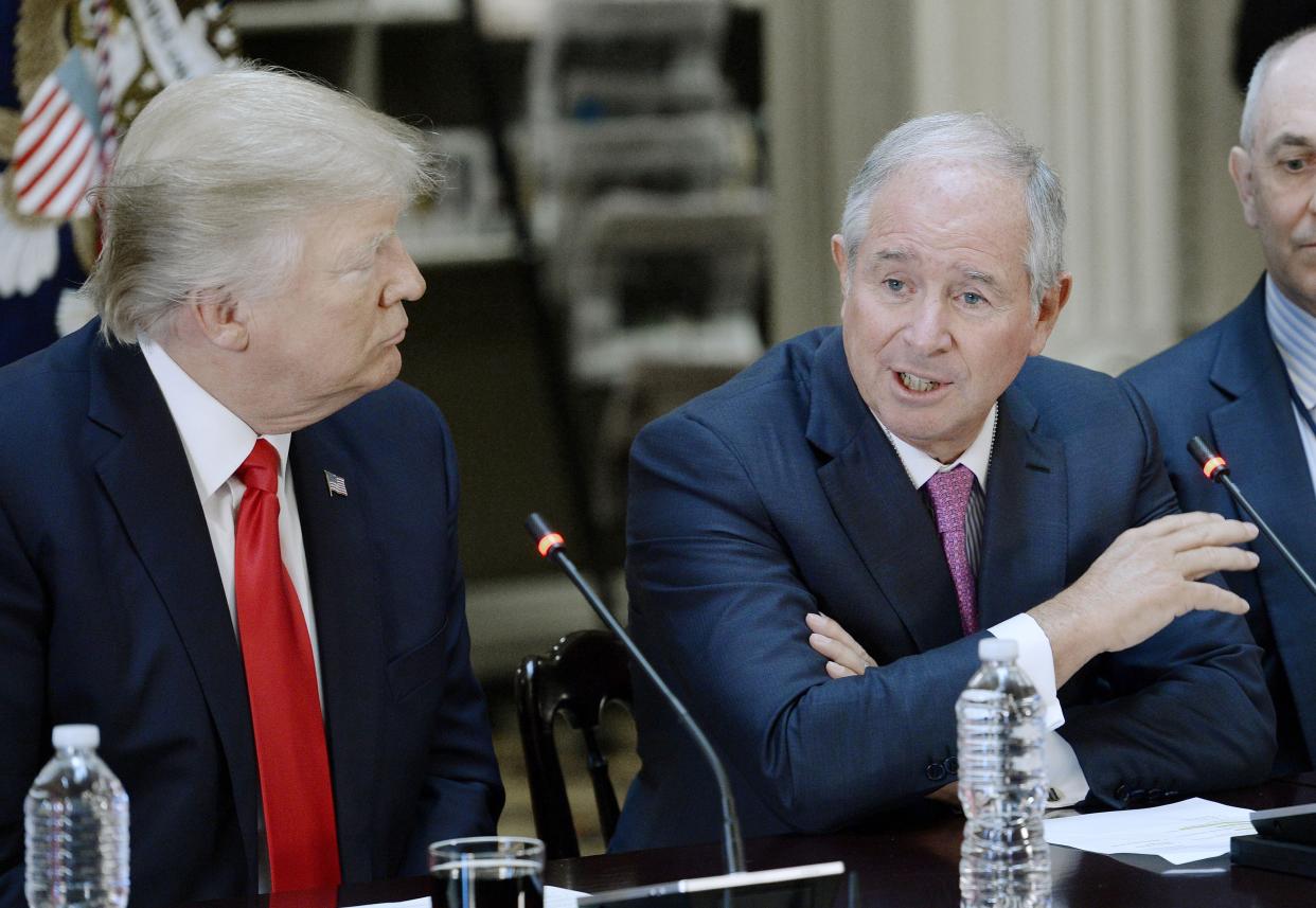 WASHINGTON, DC - APRIL 11: Stephen A. Schwarzman,  Chairman, CEO and Co-Founder of Blackstone speaks as US President Donald Trump looks on  during a strategic and policy discussion with CEOs in the State Department Library in the Eisenhower Executive Office Building (EEOB) on April 11, 2017 in Washington, DC. (Photo by Olivier Douliery-Pool/Getty Images)