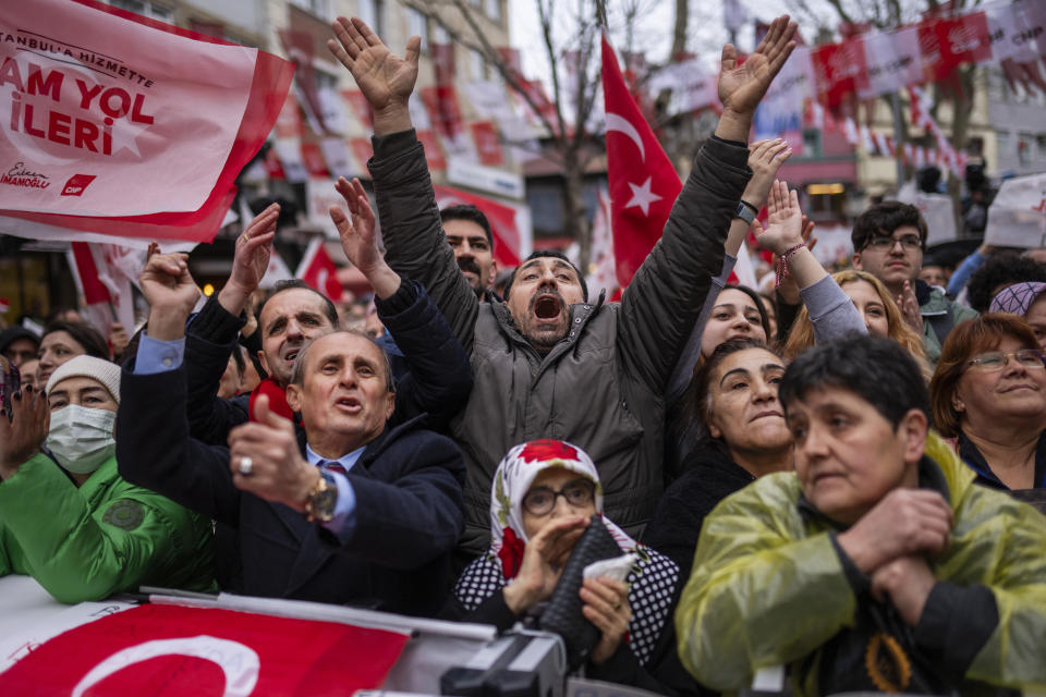 Supporters listen to Istanbul Mayor and Republican People's Party, or CHP, candidate for Istanbul Ekrem Imamoglu during a campaign rally, in Istanbul, Turkey, Tuesday, March 19, 2024. On Sunday, millions of voters in Turkey head to the polls to elect mayors and administrators in local elections which will gauge President Recep Tayyip Erdogan’s popularity as his ruling party tries to win back key cities it lost five years ago. (AP Photo/Francisco Seco)