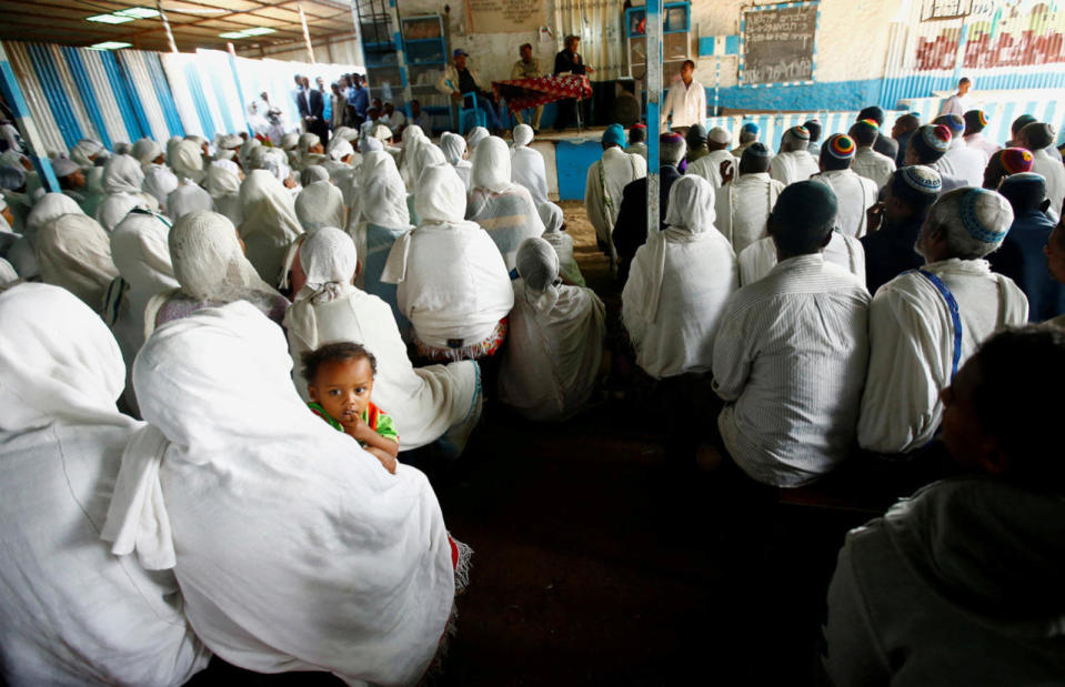 Members of the Falash Mura Jewish Ethiopian community attend a prayer service in Gondar
