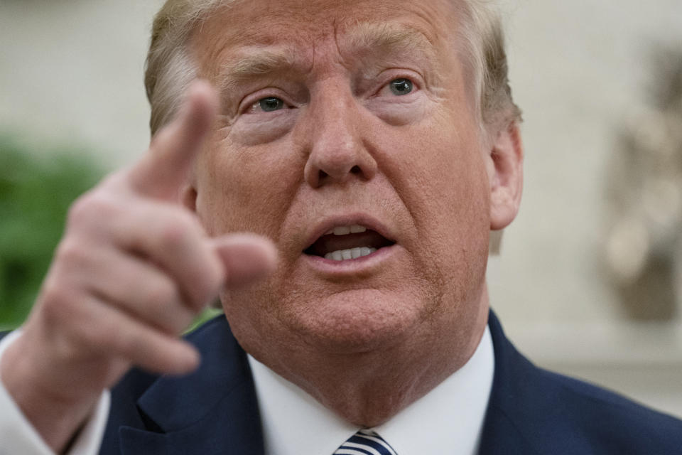 President Donald Trump speaks during a meeting with Gov. Ron DeSantis, R-Fla., on the coronavirus response, in the Oval Office of the White House, Tuesday, April 28, 2020, in Washington. (AP Photo/Evan Vucci)