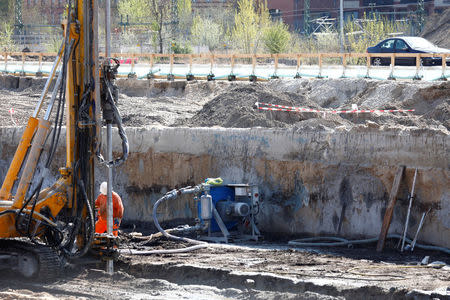 Warning tape is pictured at a construction site at Heidestrasse street near the capital's central train station, after a World War Two bomb was discovered at the site in Berlin, Germany, April 19, 2018. REUTERS/Axel Schmidt