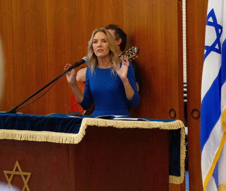 Florida Rep. Jennifer Canady, R-Lakeland, speaks during the "Stand with Israel" rally Wednesday night at Temple Emanuel in Lakeland. Canady called for solidarity with Israel.