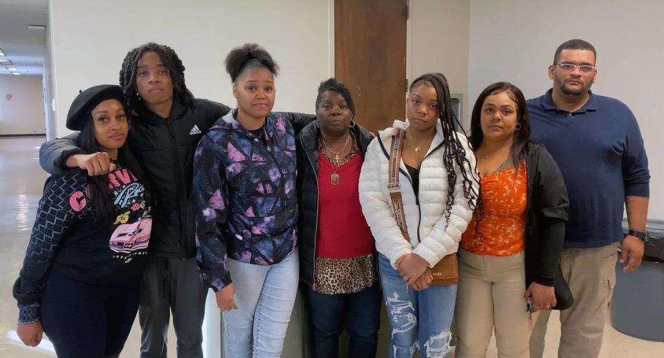 Delilah Dukes, center, is surrounded by family members as she speaks to the media after a verdict was reached in the trial of the man found guilty of killing her son Joseph Dukes in 2021.